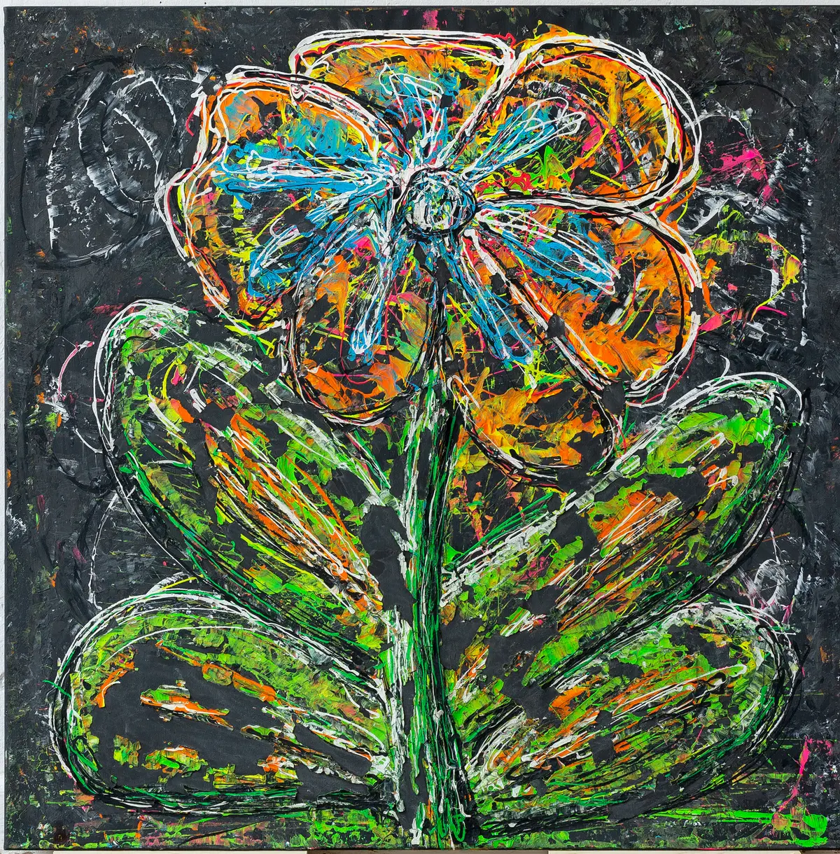 A large blossom with turquoise petals and broad green leaves on a black ground