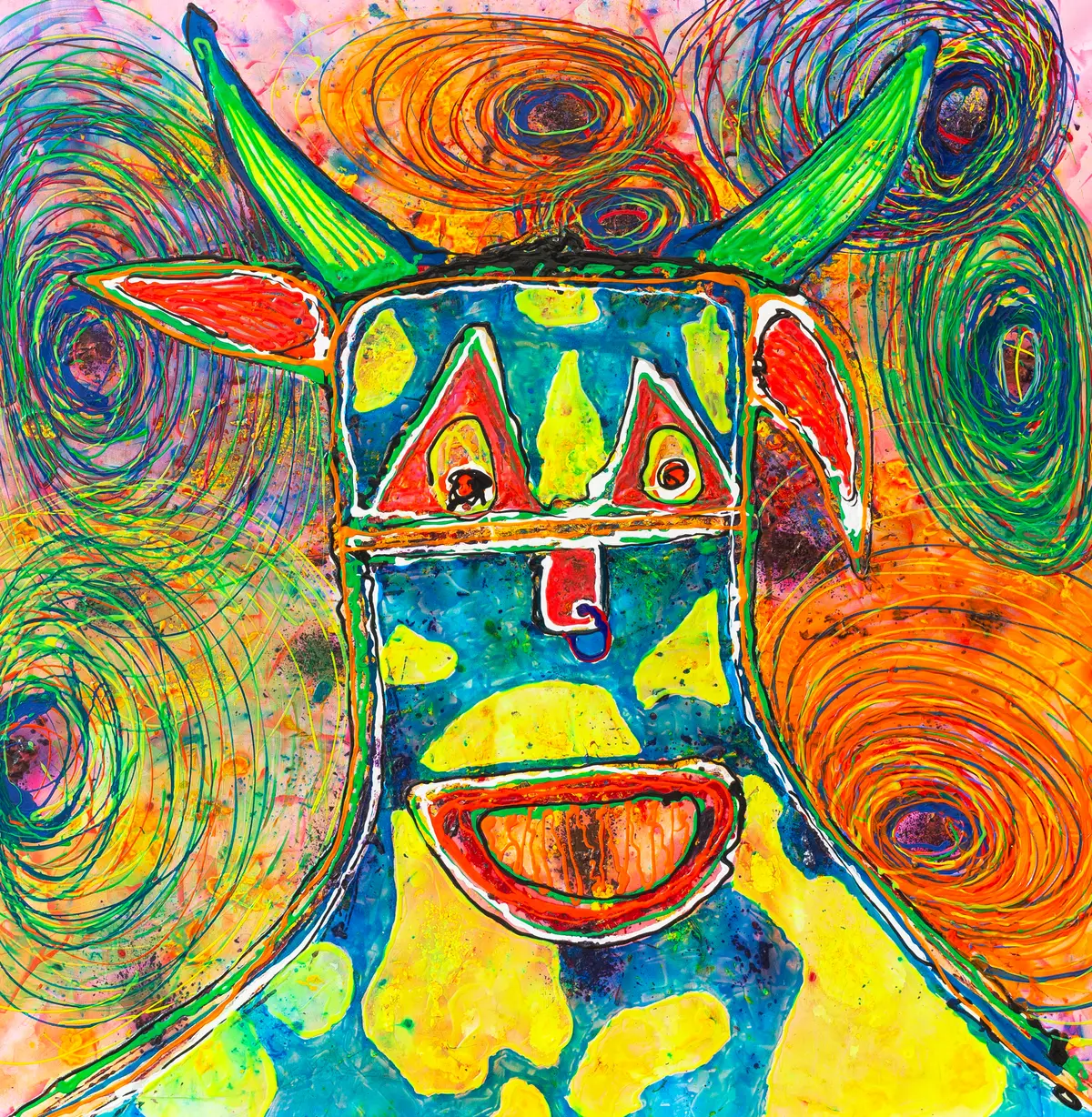 A cow-like creature with green horns and a wide open mouth in turquoise, yellow and orange