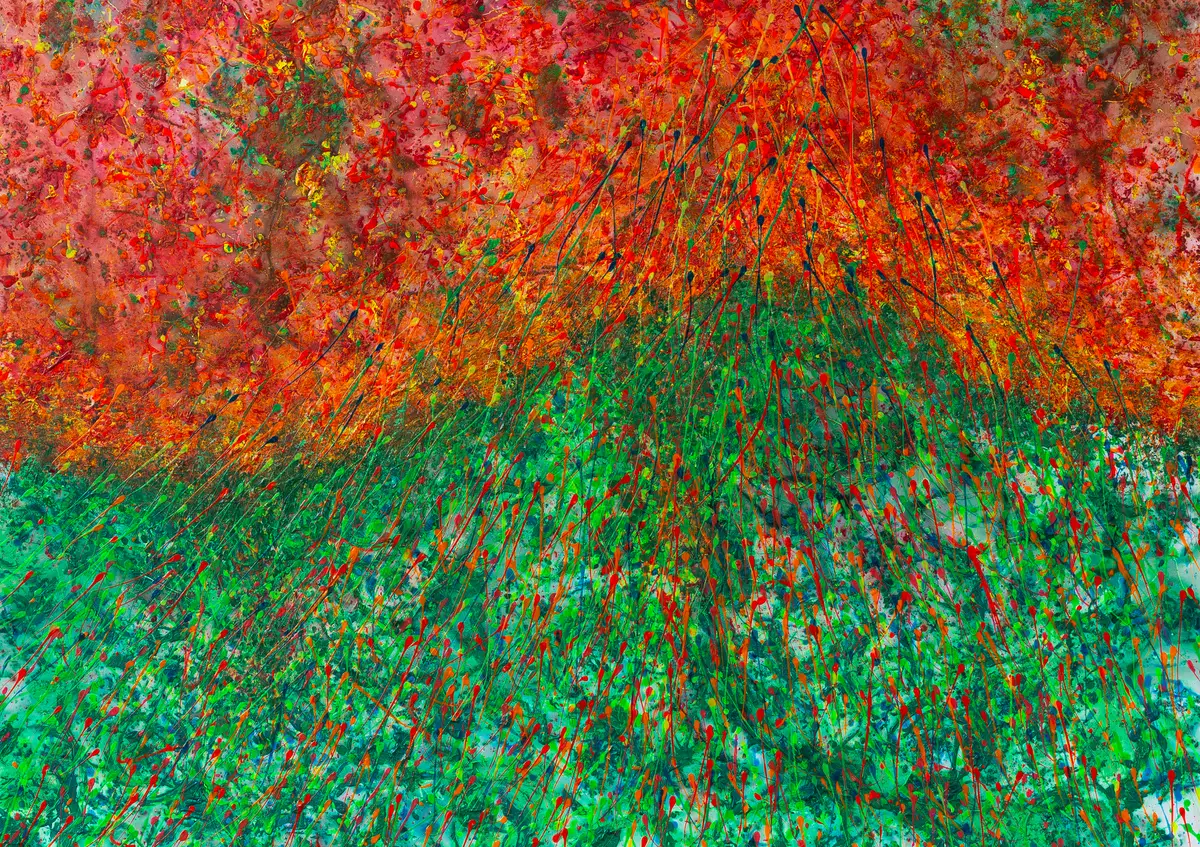 Wide format with an orange-red upper half and a green lower half made of fine paint splatters